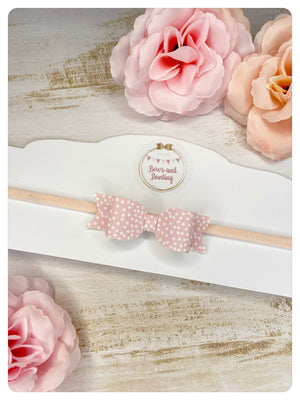 Mini Baby Pink Spot Bow Band