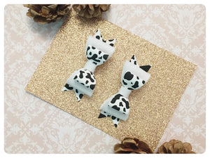 Set of 2 Mini Black & White Faux Leather & Wool Felt Cow Print Pigtail Bows